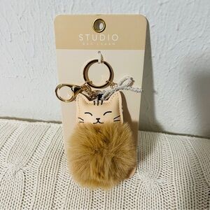 Studio New Bag Charm Key Chain Plush Cat Design with a Pom-Pom Pearl Bow